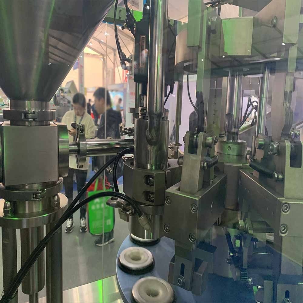 Máquina automática de llenado y engaste de tubos metálicos VK-TFS-009A