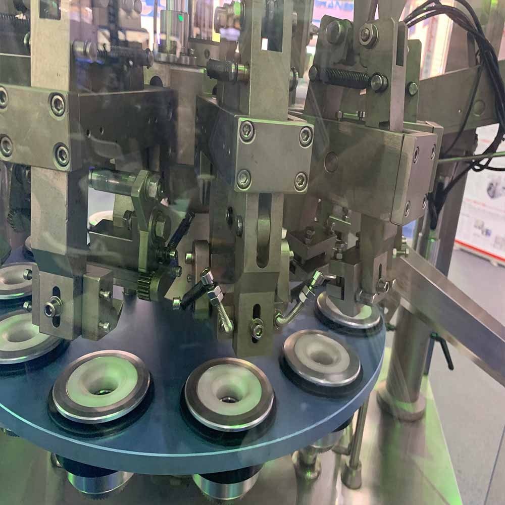 Máquina automática de llenado y engaste de tubos metálicos VK-TFS-009A