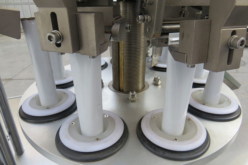 Máquina automática de llenado y engaste de tubos metálicos VK-TFS-009A