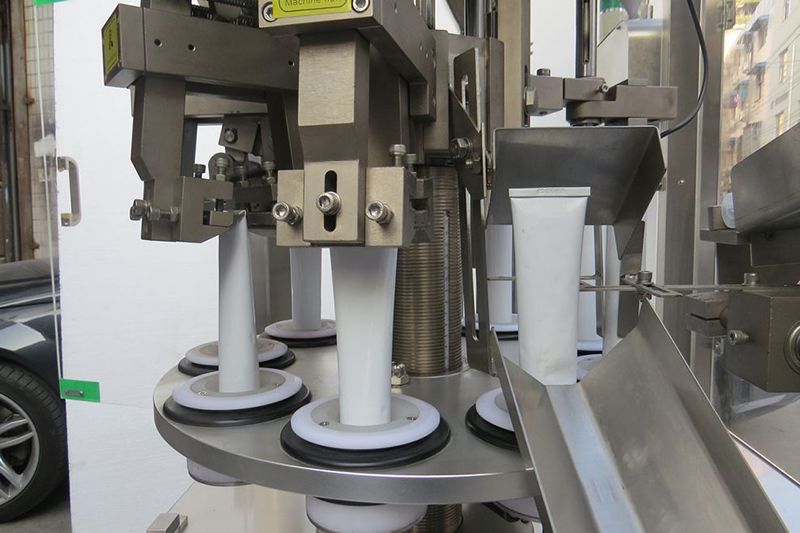 Máquina automática de llenado y engaste de tubos metálicos VK-TFS-009A