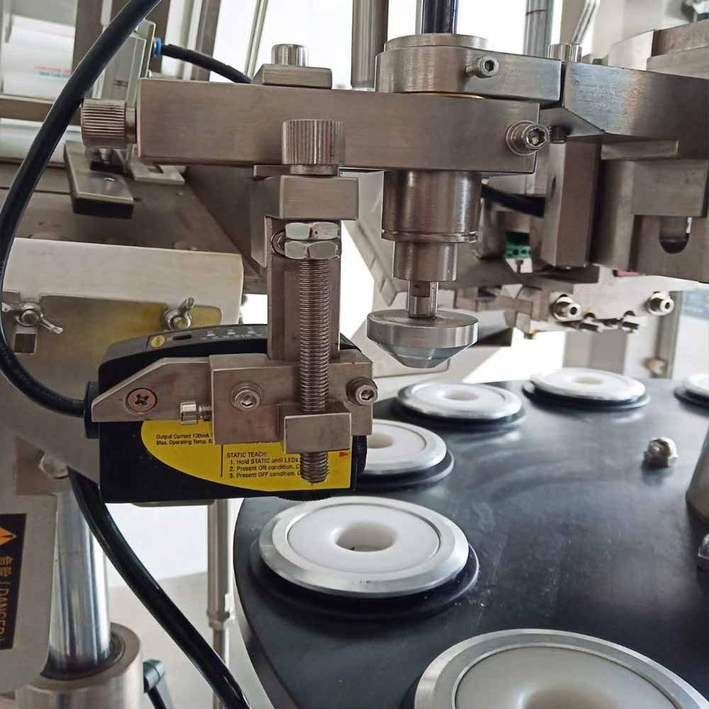 Máquina automática de llenado y engaste de tubos metálicos VK-TFS-009A